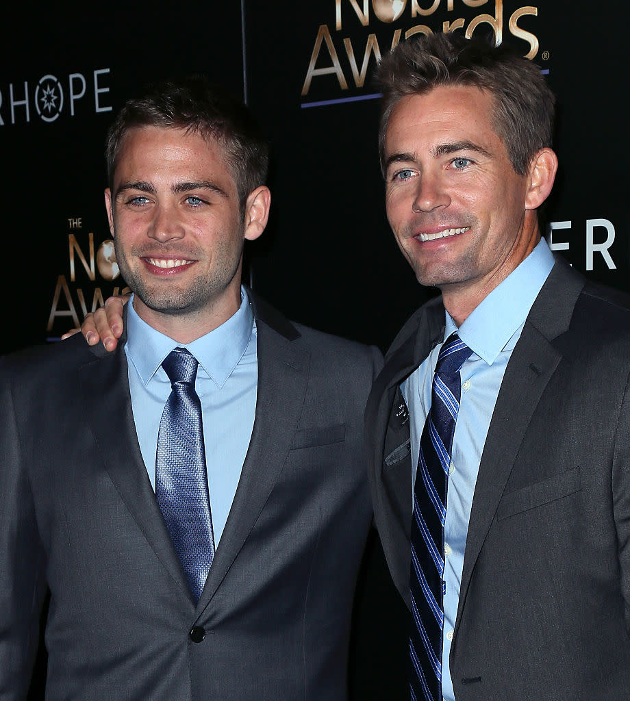 Cody, left, and Caleb Walker at the Noble Awards in Beverly Hills to honor their brother in 2015. (Photo: David Livingston/Getty Images)