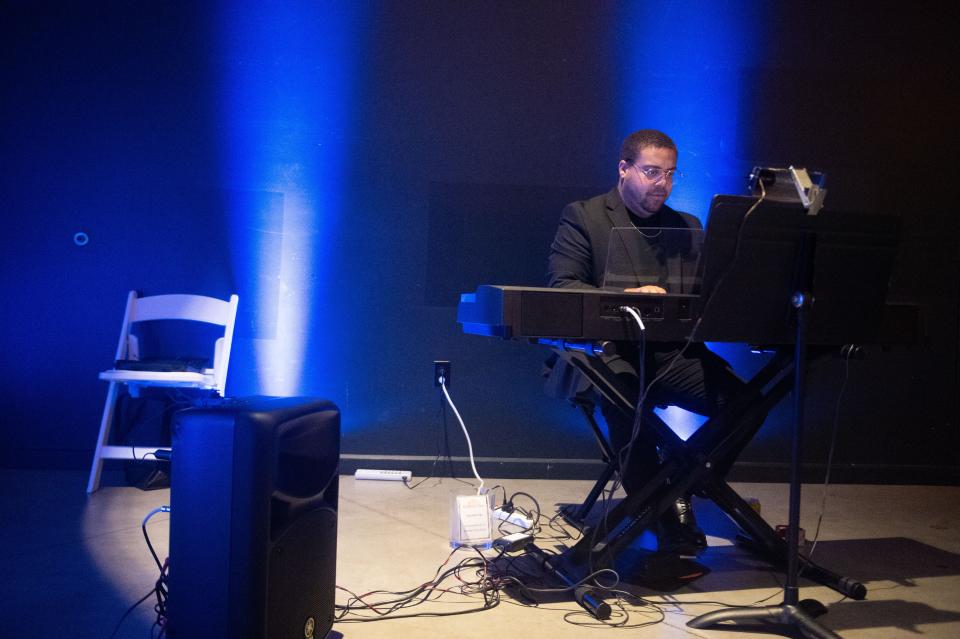 Pianist Brandon Coffer provides music during the Marble City Opera's 10th Season Benefit at The Dogwood Center in Knoxville, Tenn. on Saturday, Jan. 14, 2023.