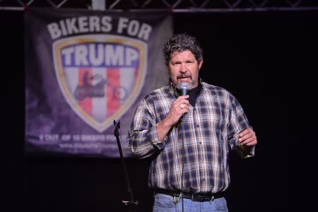 Organizer Chris Cox speaks at a Bikers for Trump 2016 rally at Jergel's Rhythm Grille in Warrendale, Pennsylvania April 24, 2016. REUTERS/Alan Freed/File Photo