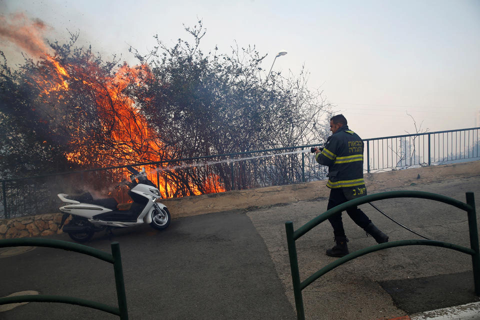 Massive wildfires tear across Israel