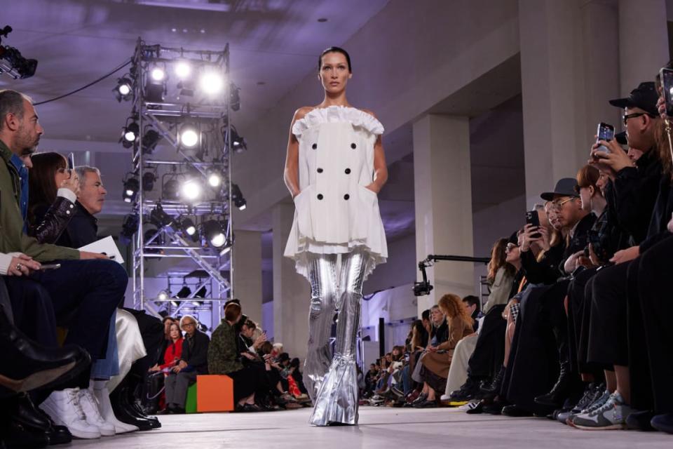 <div class="inline-image__caption"><p>Bella Hadid walks the runway during the Sacai Womenswear Spring/Summer 2023 show as part of Paris Fashion Week.</p></div> <div class="inline-image__credit">Peter White/Getty</div>