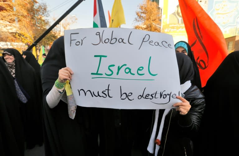 Iranian protesters hold anti-Israeli slogans during a demonstration in Tehran on December 11, 2017 to denounce US President Donald Trump's declaration of Jerusalem as Israel's capital