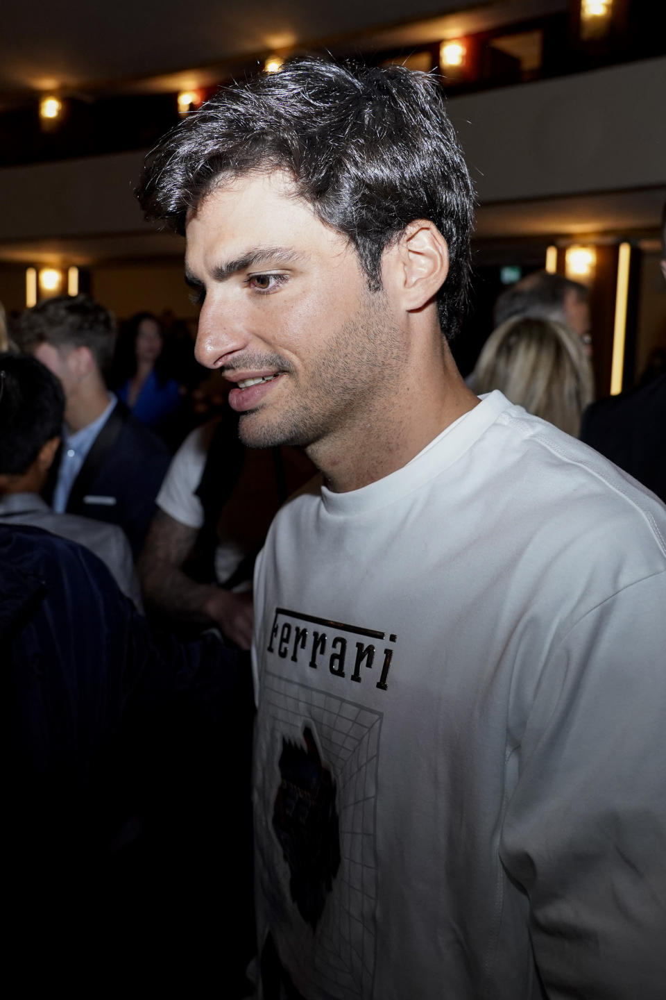 Carlos Sainz Jr. is seen attending the Ferrari women's Spring Summer 2023 collection presented in Milan, Italy, Sunday, Sept. 25, 2022. (AP Photo/Alberto Pezzali)