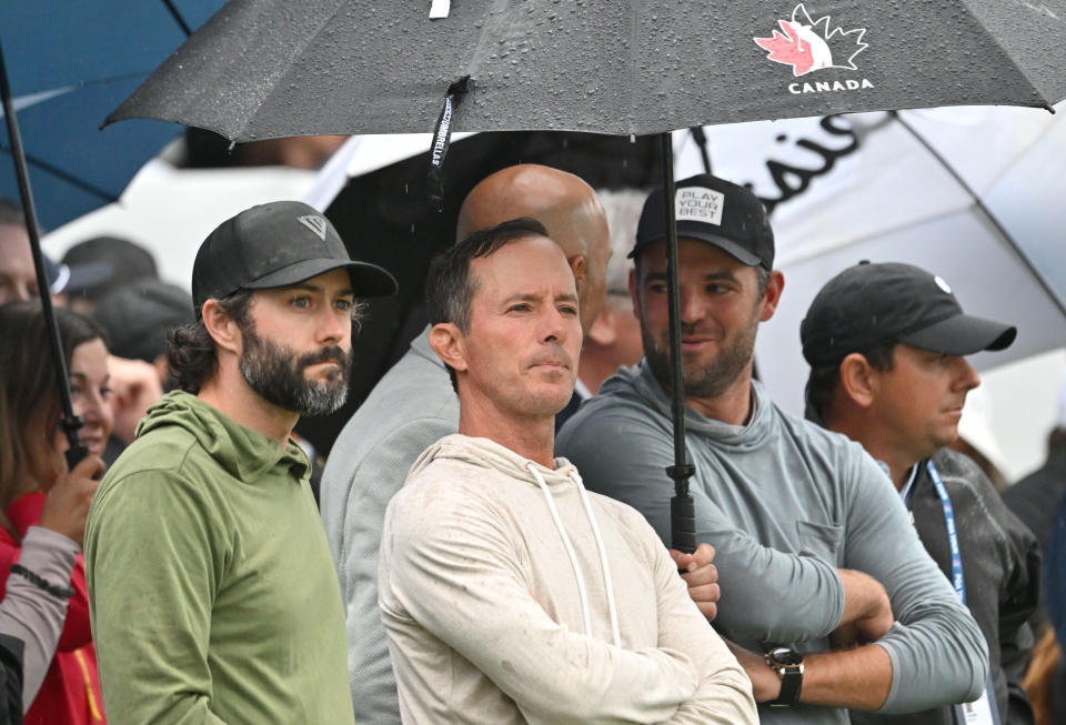 Adam Hadwin, Mike Weir and Corey Conners were on the green to watch fellow Canadian Nick Taylor win the RBC Canadian Open Sunday night in Toronto