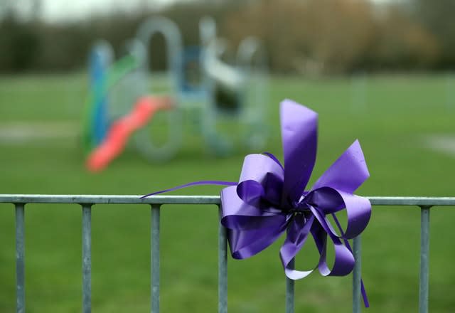 A purple bow attached to railings in St Neot’s Road, Harold Hill, in memory of Jodie Chesney