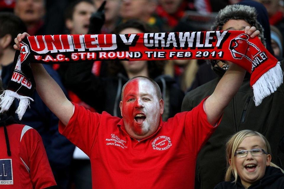Crawley Town fans soak up the atmosphere. (Photo: Alex Livesey)