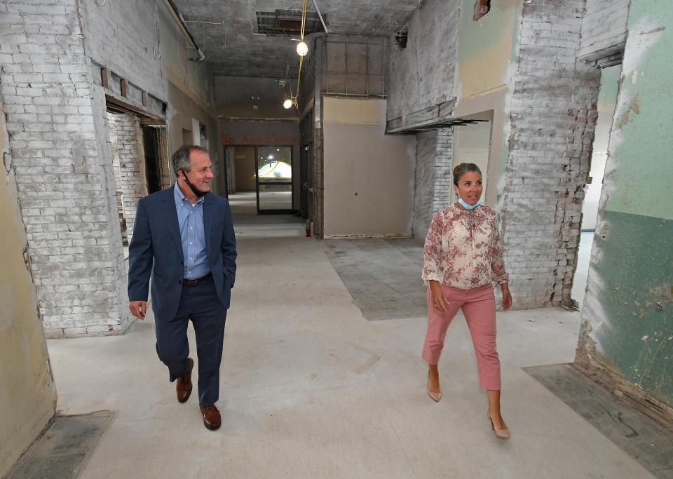 Charles "Boo" Hagerty and Daria Devlin walk through the first floor of the former Wayne School, 650 East Ave., on July 30, 2020. This 16,500-square-foot-space was being renovated into studios and classrooms for the Erie Center for Arts and Technology, which owns the 80,180-square-foot building. Hagerty is president of the Hamot Health Foundation, which is an investor in ECAT, and is the ECAT board chairman. Devlin is the executive director of ECAT.