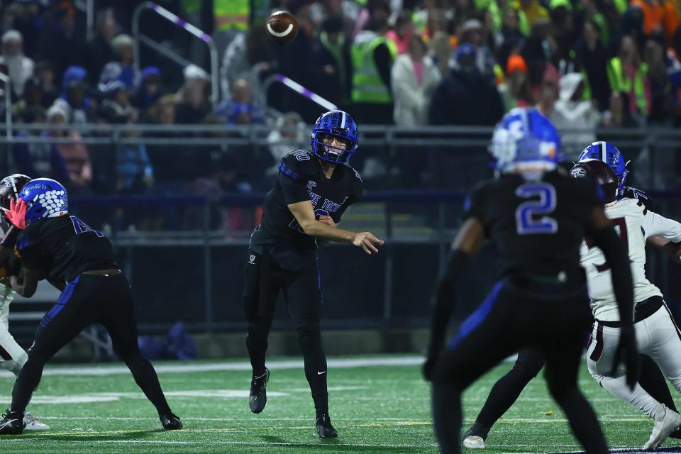 Middletown Cavaliers quarterback Austin Troyer (10) attempts a pass to during a regular season game between Appoquinimink and Middletown Friday, Nov. 10, 2023, at Cavalier Stadium, in Middletown, DE.