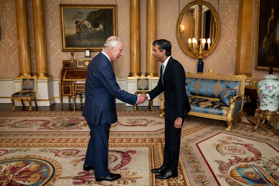 King Charles III and Rishi Sunak during an audience at Buckingham Palace on October 25, 2022.
