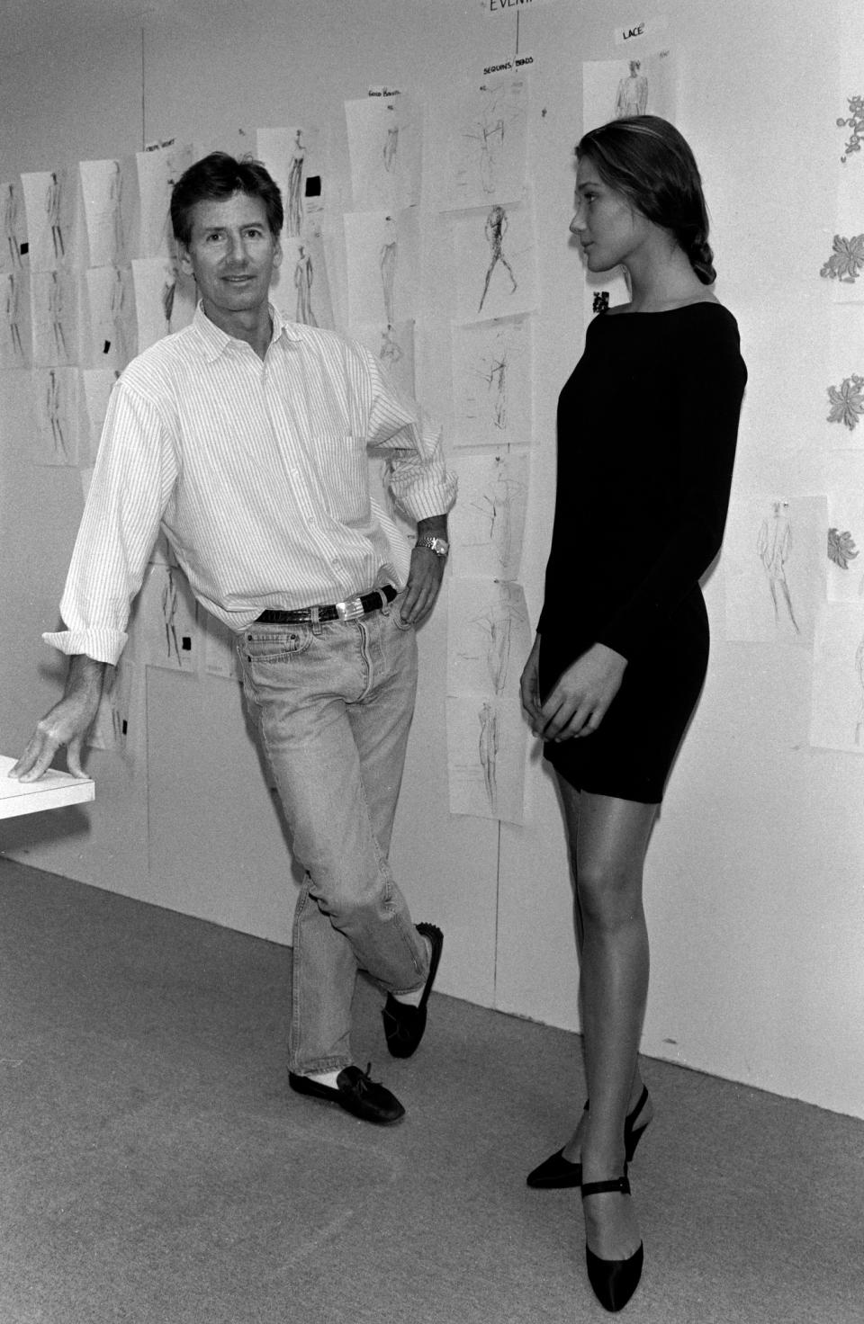 designer Calvin Klein, and Carla Bruni pose for pictures during a preview of Seventh Avenue designers.