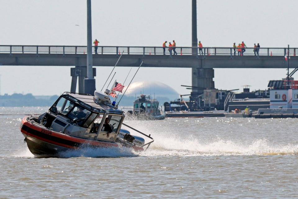 PHOTO: A U.S. Coast Guard boat patrols the waters near the site where a barge hit the Pelican Island Bridge, May 15, 2024, in Galveston, Texas. (David J. Phillip/AP)