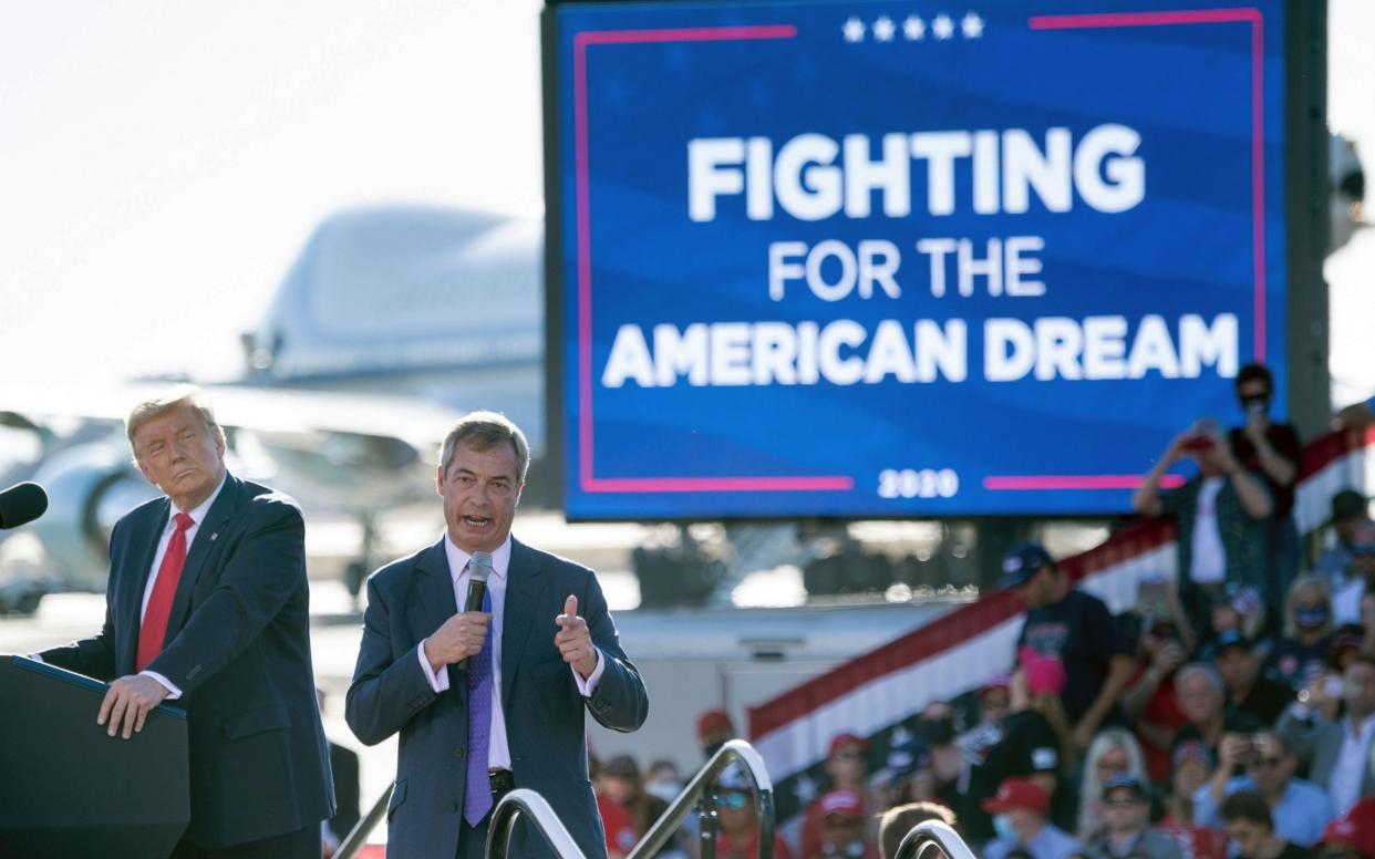 Nigel Farage on stage with Donald Trump - Brendan Smialowski / AFP