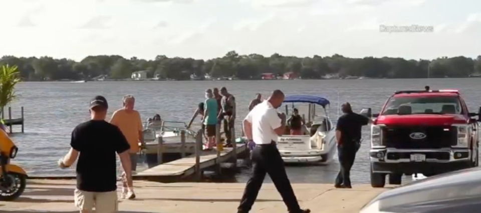 Police respond to the scene of a boat crash on Lake Marie in Illinois, where two girls on a jet ski died after colliding with a boat on June 28, 2024 (ABC7 Chicago)