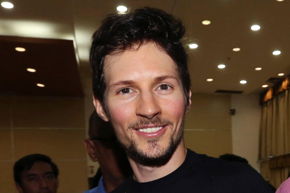 FILE - Telegram co-founder Pavel Durov, center, smiles following his meeting with Indonesian Communication and Information Minister Rudiantara in Jakarta, Indonesia on Aug. 1, 2017. (AP Photo/Tatan Syuflana, File)