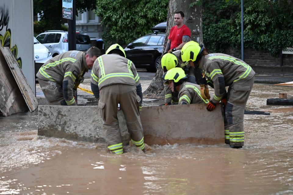 Firefighters respond to flooding on Willesden Lane (Jeremy Selwyn)