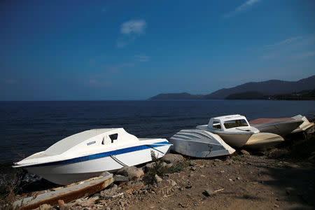 Abandoned speedboats, used by refugees and migrants since 2015 to cross part of the Aegean Sea from Turkey to Greece, are seen at a beach near the Skala Sikamias village, on the island of Lesbos, Greece, October 5, 2016. REUTERS/Alkis Konstantinidis