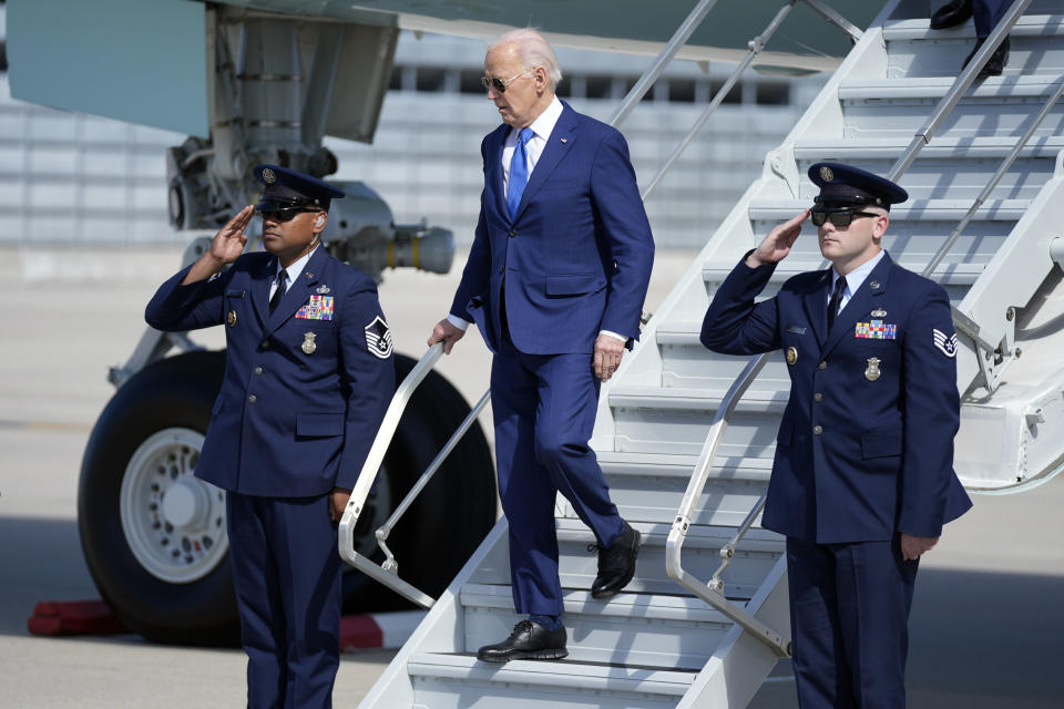 President Joe Biden arrives at Chicago O'Hare International Airport to attend a political fundraiser, Wednesday, May 8, 2024, in Chicago. (AP Photo/Evan Vucci)