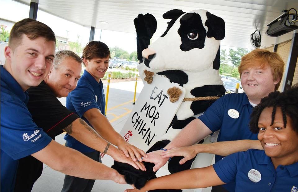 New staff and staff trainers prepare for opening day at Chick-fil-A in Fall River.