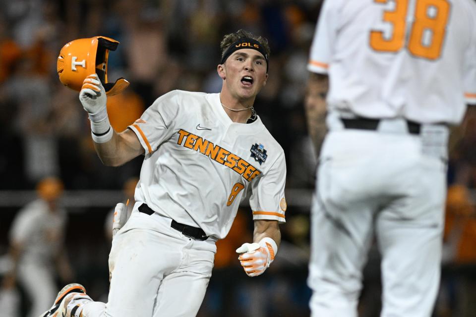 Tennessee Volunteers left fielder Dylan Dreiling celebrates after driving in the game-winning drive to defeat Florida State.