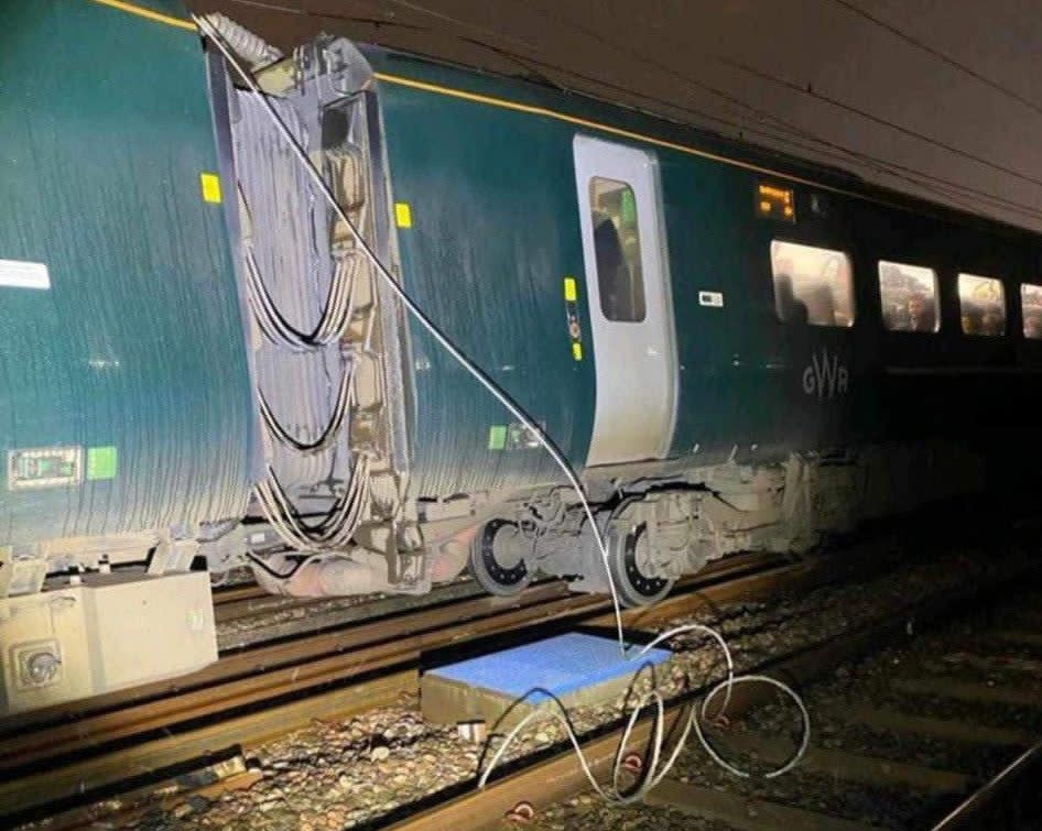 A train with damaged overhead electric cables in the Ladbroke Grove area of west London