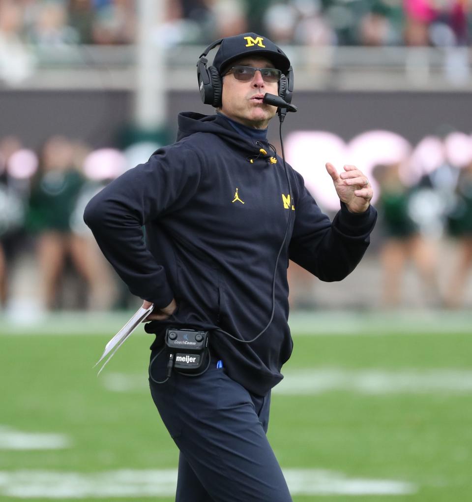 Michigan Wolverines head coach Jim Harbaugh during action against the Michigan State Spartans in the first half Saturday, Oct. 30, 2021 at Spartan Stadium in East Lansing.