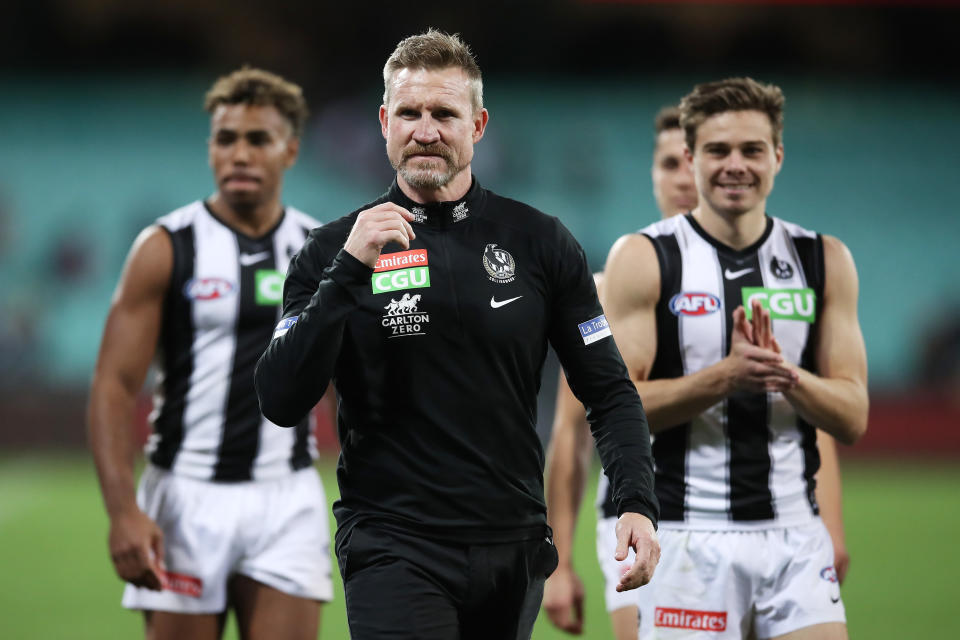 Nathan Buckley, pictured here after coaching his final game for Collingwood in 2021.