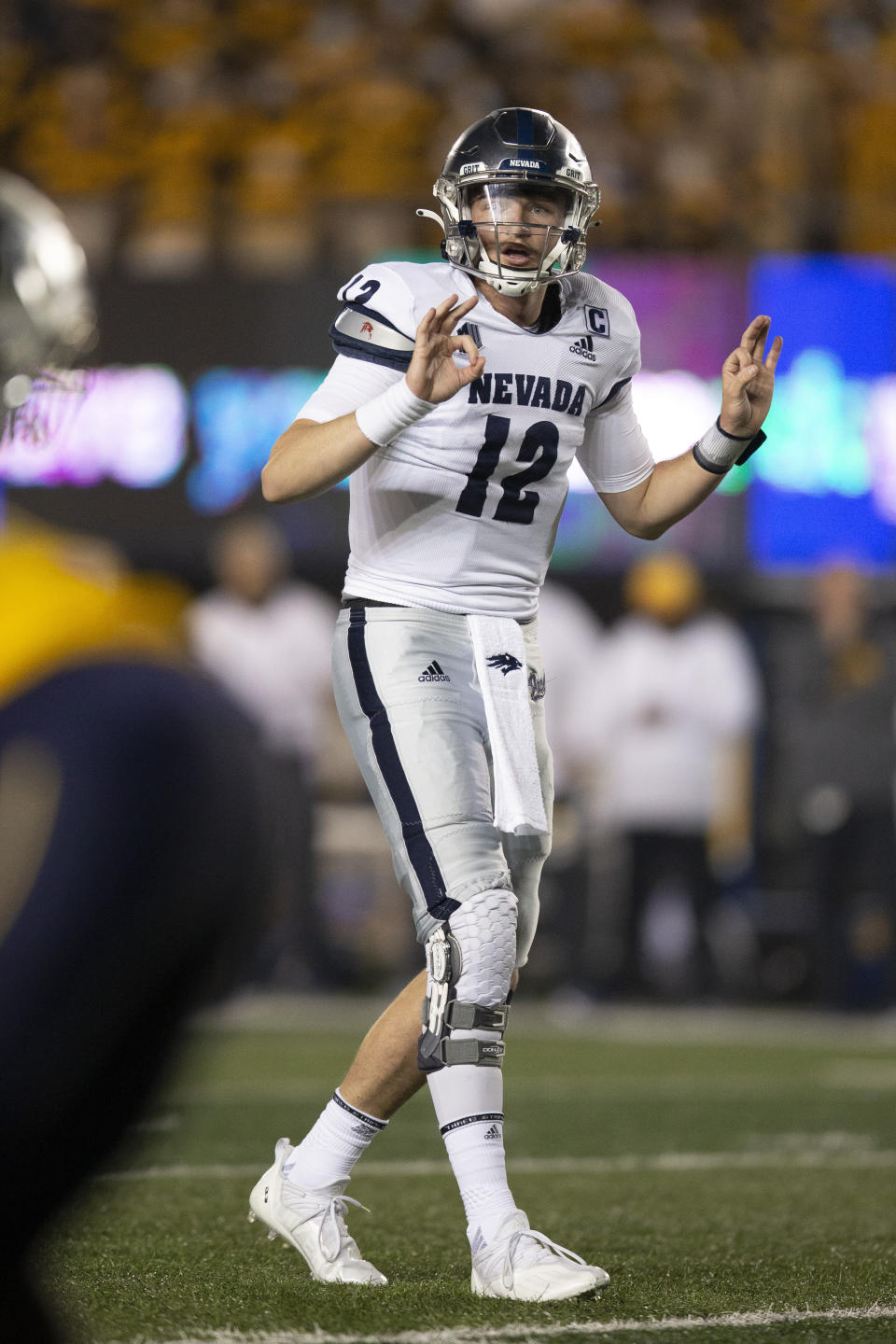 Nevada quarterback Carson Strong calls signals to teammates during the second quarter of an NCAA college football game against California, Saturday, Sept. 4, 2021, in Berkeley, Calif. (AP Photo/D. Ross Cameron)