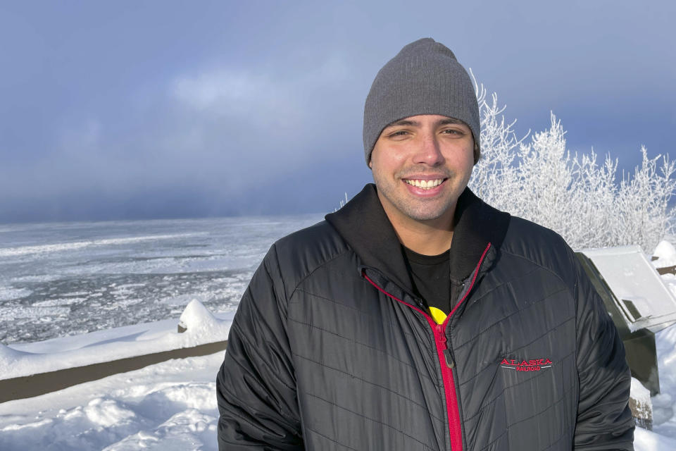 DuShan Vujnovic, a native of Serbia who has lived the last five years in Alaska, visits a park overlooking Cook Inlet in Anchorage, Alaska, Thursday, Feb. 1, 2024. Much of Alaska has plunged into a deep freeze, with temperatures well below zero and Anchorage seeing some of its coldest temperatures in years. (AP Photo/Mark Thiessen)