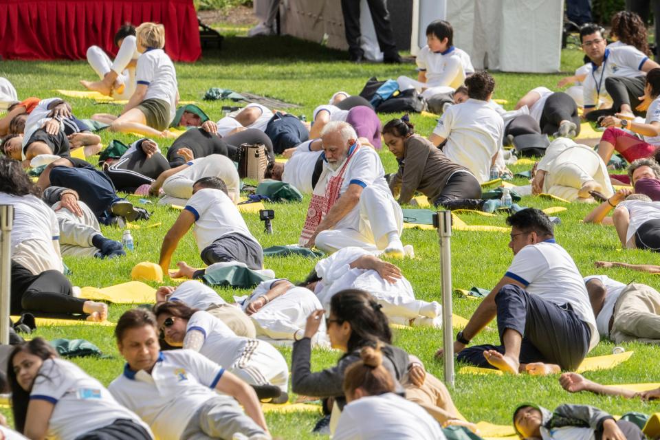 India Prime Minister Narendra Modi, center, practices yoga during the International Yoga day event at United Nations headquarters in New York on June 21, 2023.