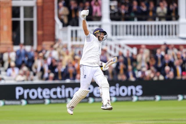 Joe Root punches the air in celebration