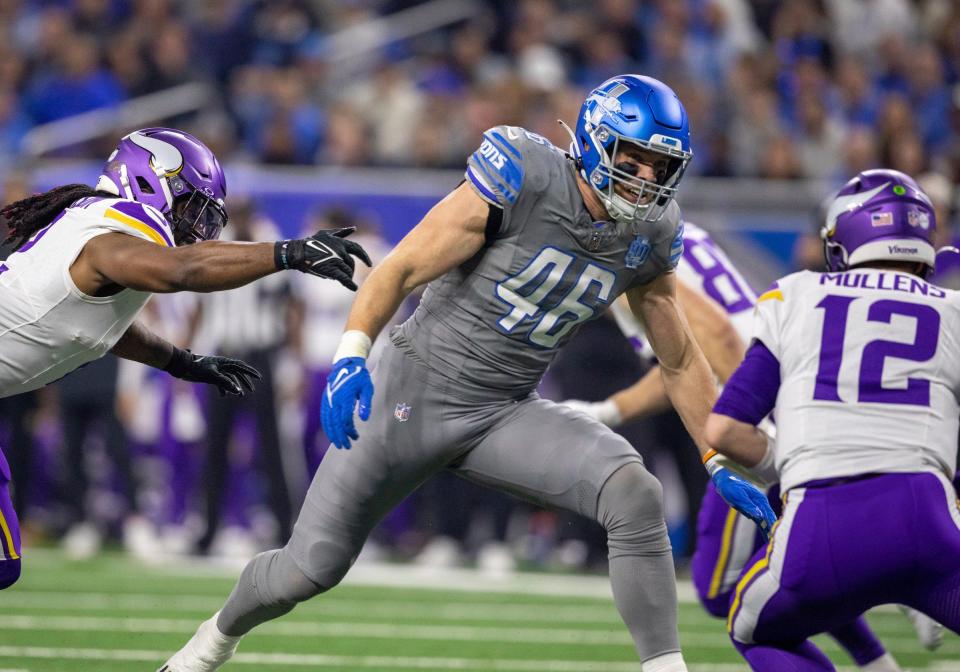 Detroit Lions Jack Campbell prepares to tackle Minnesota Vikings quarterback Nick Mullens at Ford Field in Detroit on Sunday, Jan. 7, 2024.