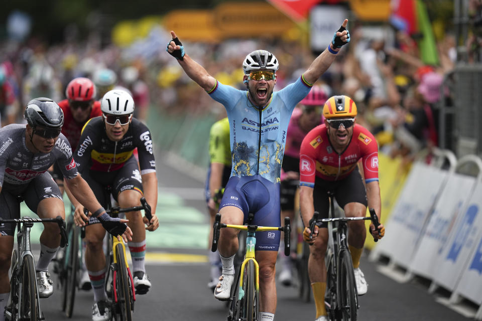 Britain's sprinter Mark Cavendish crosses the finish line for a record 35th Tour de France stage win, breaking the record of Belgian legend Eddy Merckx, in the fifth stage of the Tour de France cycling race over 177.4 kilometers (110.2 miles) with start in Saint-Jean-de-Maurienne and finish in Saint-Vulbas, France, Wednesday, July 3, 2024. (AP Photo/Daniel Cole)