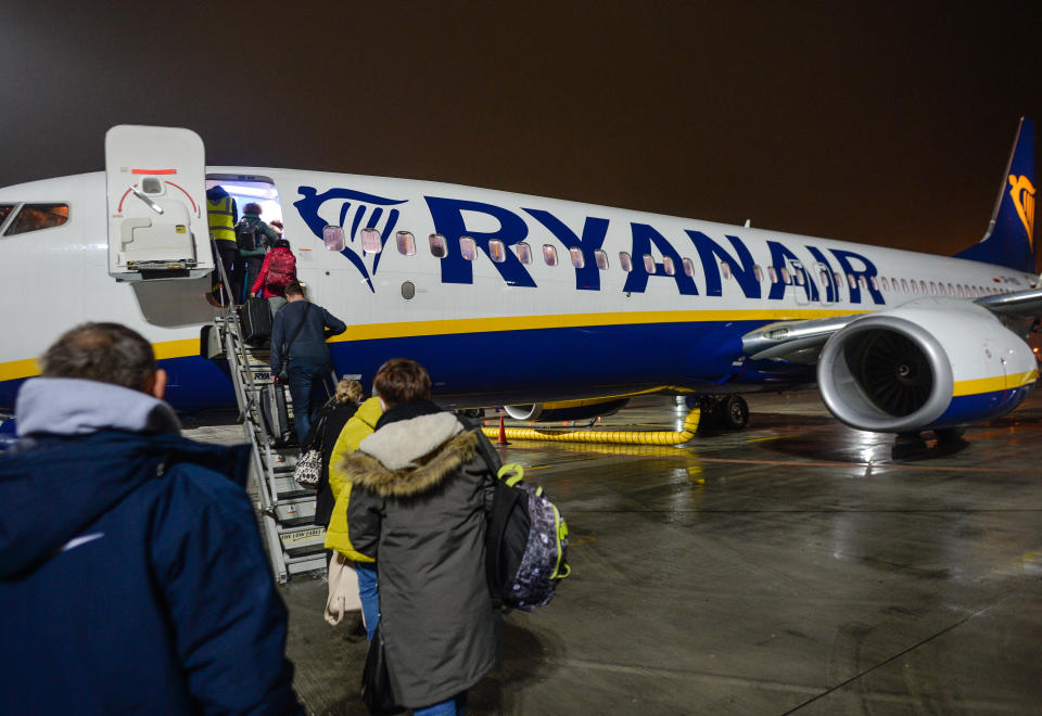 Passengers boarding a Ryanair plane to Dublin at John Paul II Krakow-Balice International Airport. 
On Sunday, December 13, 2020, in Krakow-Balice International Airport, Krakow, Poland. (Photo by Artur Widak/NurPhoto via Getty Images)