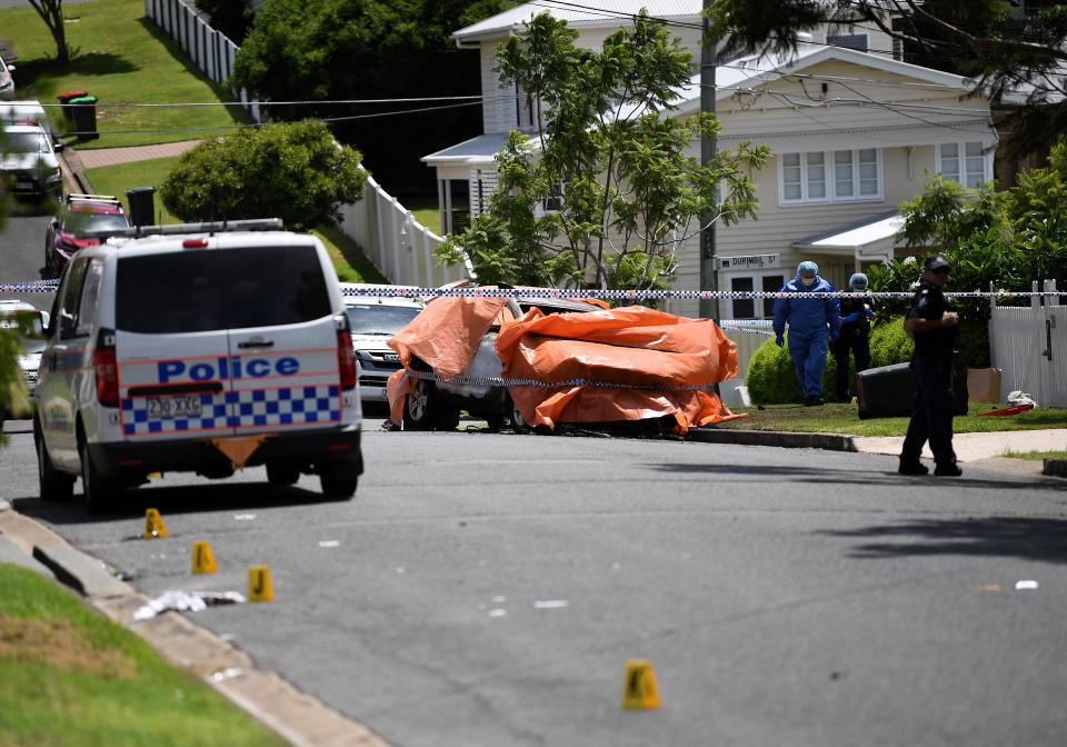 Police attend the scene of the fatal car fire in Camp Hill. Source: AAP