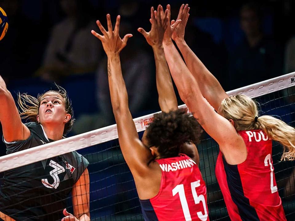 Outside hitter Kiera Van Ryk, left, topped Canada with 15 points in Monday's three-set loss to the United States in Pool C action at the volleyball women's world championship in Arnhem, Netherlands. (Courtesy volleyballworld.com - image credit)