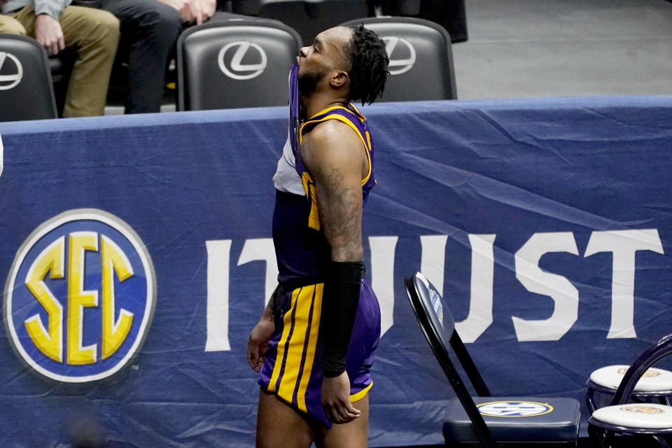LSU's Ja'Vonte Smart leaves the court after LSU lost to Alabama in the championship game at the NCAA college basketball Southeastern Conference Tournament Sunday, March 14, 2021, in Nashville, Tenn. (AP Photo/Mark Humphrey)