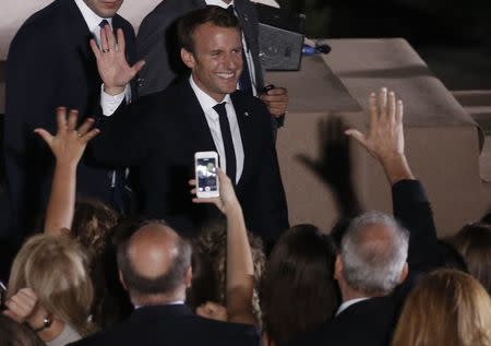 French President Emmanuel Macron waves after delivering a speech atop the Pnyx Hill in Athens, Greece, September 7, 2017. REUTERS/Alkis Konstantinidis