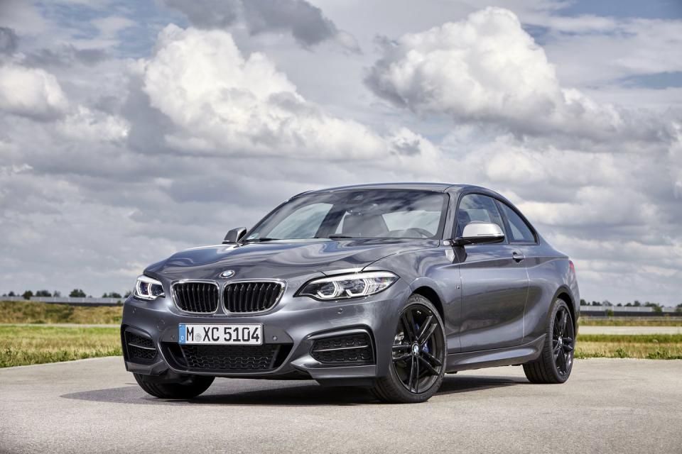 <p>Base price: $36,295</p><p><a rel="nofollow noopener" href="https://www.caranddriver.com/bmw/2-series" target="_blank" data-ylk="slk:The 2-series umbrella;elm:context_link;itc:0;sec:content-canvas" class="link ">The 2-series umbrella</a> covers a multitude of small, two-door BMWs: There is the four-cylinder 230i and the six-cylinder M240i, as well as xDrive all-wheel-drive versions of both (rear-wheel drive is standard). Oh, and you can also opt for any 2-series in convertible guise. All of them fall under the $50,000 mark save for the M240i xDrive convertible, and that model only edges over our price cap by $3395. Among today's BMWs, the 2-series family hews closest to the company's spiritual center: Agile handling and sweet and thrilling engines.</p>