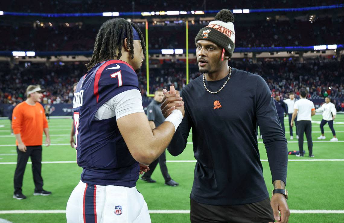 Jan 13, 2024; Houston, Texas, USA; Houston Texans quarterback C.J. Stroud (7) and Cleveland Browns quarterback Deshaun Watson greet on the field after a 2024 AFC wild card game at NRG Stadium. Troy Taormina/USA TODAY Sports