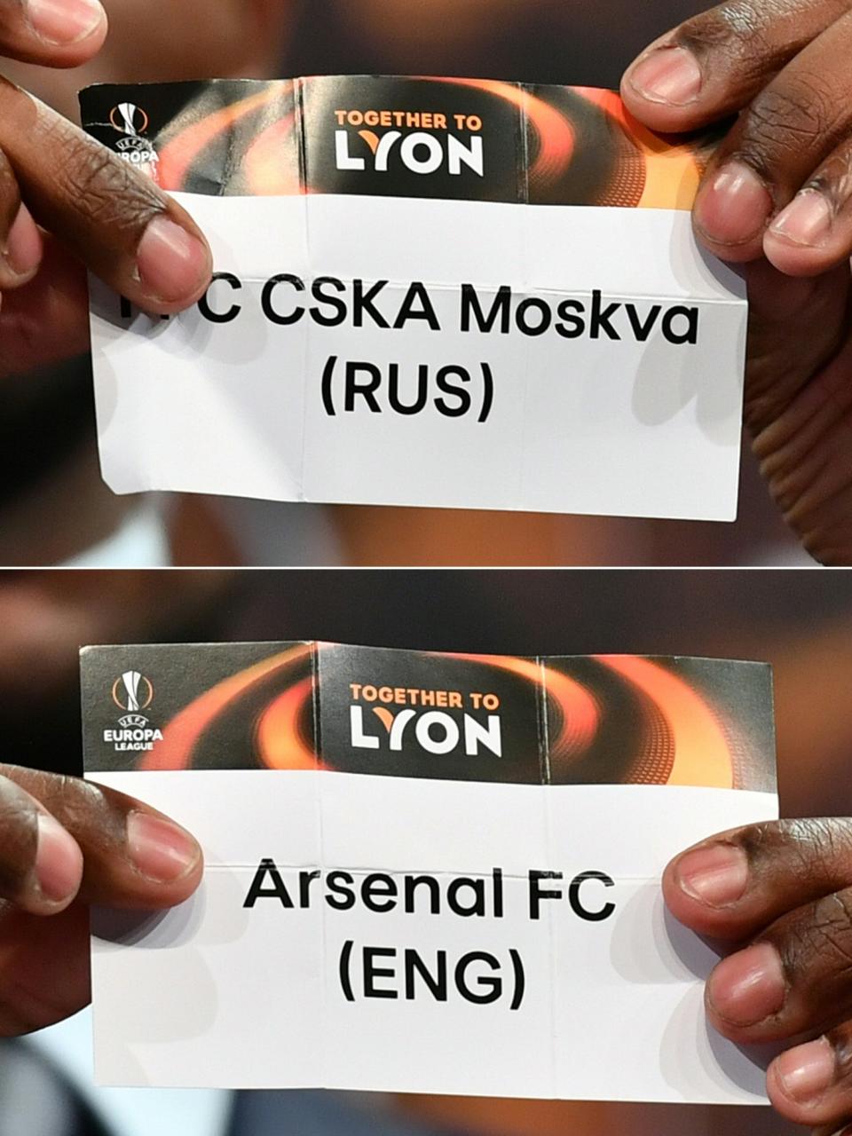 Eric Abidal showing the slip of PFC CSKA Moskva and Arsenal FC during the draw for the quarter finals