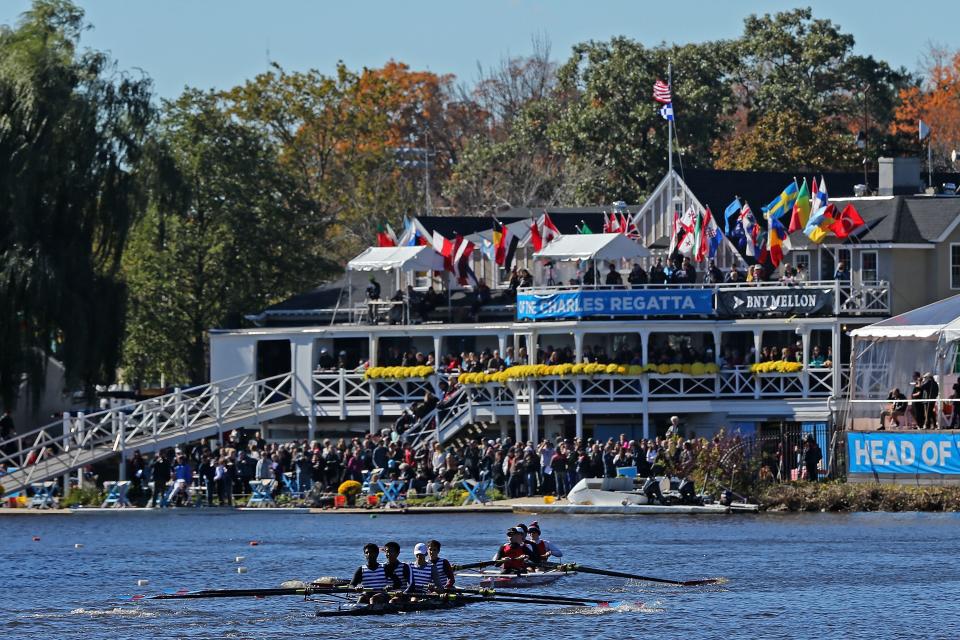 CAMBRIDGE, MA - OCTOBER 23: Competitors pass in front of the Cambridge Boat Club during Day 2 of The 52nd Head of the Charles Regatta on October 23, 2016 in Cambridge, Massachusetts.  (Photo by Maddie Meyer/Getty Images)