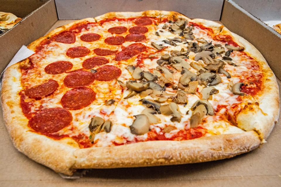 A close-up of finalist Margherita's Pizza mushroom and pepperoni pie is featured during the Delaware's Favorite Pizza Challenge bracket finals held in the News Journal's newsroom in New Castle, Monday, March 27, 2023.