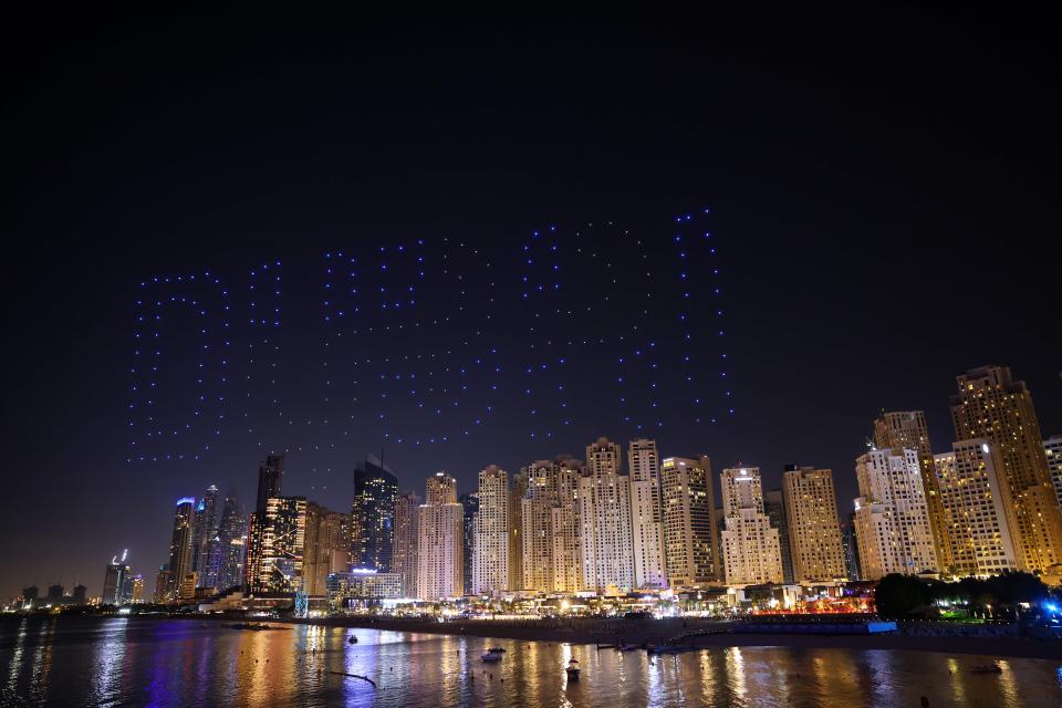 A drone light show is pictured at Jumeirah Beach Residence in Dubai on January 13, 2021.