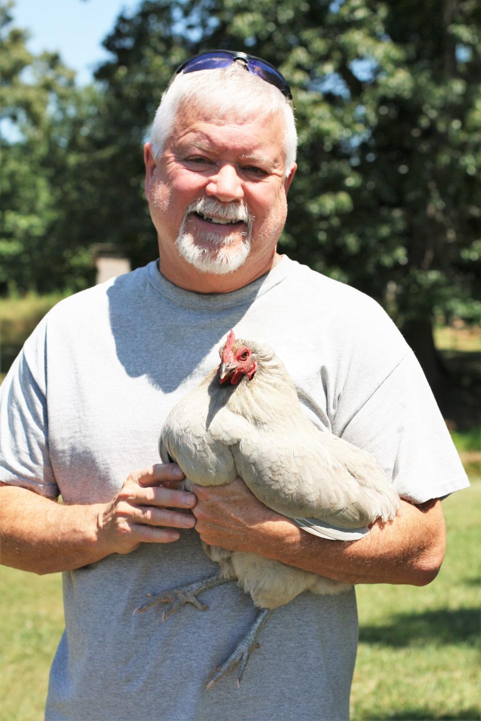 Greg Mathews, co-owner of MGM Lavender Farm in Halls, with ‘Lavvy’ on June 20, 2022.