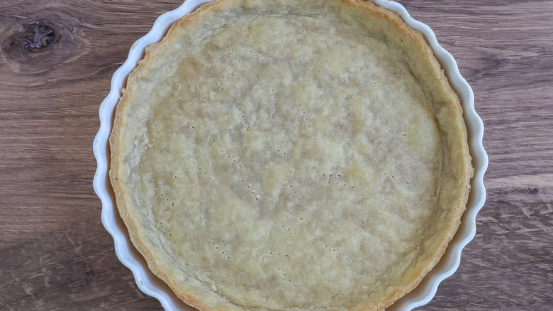 baked quiche crust in a pan