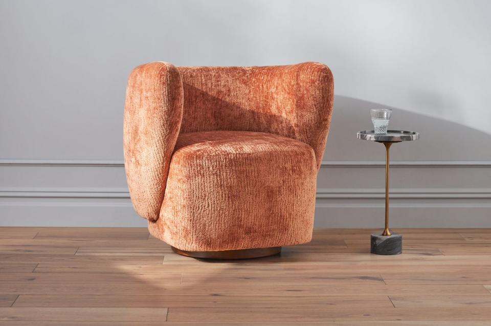 <p><a href="https://go.redirectingat.com?id=74968X1596630&url=https%3A%2F%2Fwww.anthropologie.com%2Fshop%2Fdoris-swivel-chair&sref=https%3A%2F%2Fwww.elledecor.com%2Fshopping%2Ffurniture%2Fg35163937%2Fsoft-cozy-chairs%2F" rel="nofollow noopener" target="_blank" data-ylk="slk:Shop Now;elm:context_link;itc:0;sec:content-canvas" class="link ">Shop Now</a></p><p>Doris Swivel Chair</p><p>anthropologie.com</p><p>$1498.00</p><span class="copyright">Courtesy of Anthropologie</span>