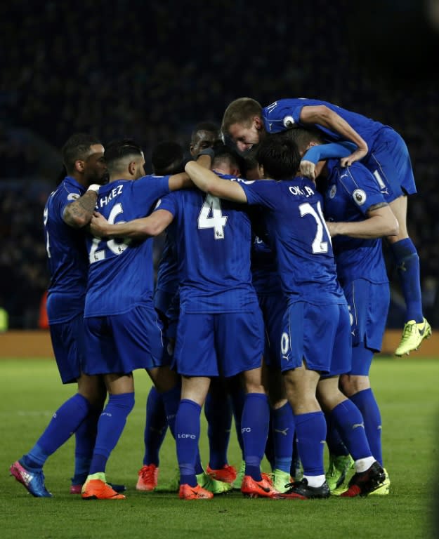 Leicester City's midfielder Danny Drinkwater (C) celebrates with teammates after scoring his team's second goal during the English Premier League football match against Liverpool February 27, 2017