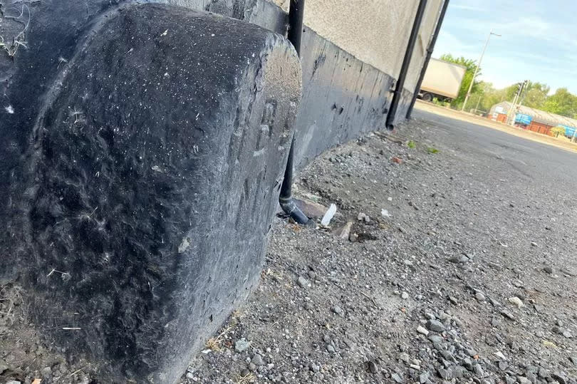 The Anchor landlord Alan Banks believes this is a waymarker stone, outside his Saltney pub, denoting the Wales-England border. It has the initials HBD and the letter M but its origins are unclear.