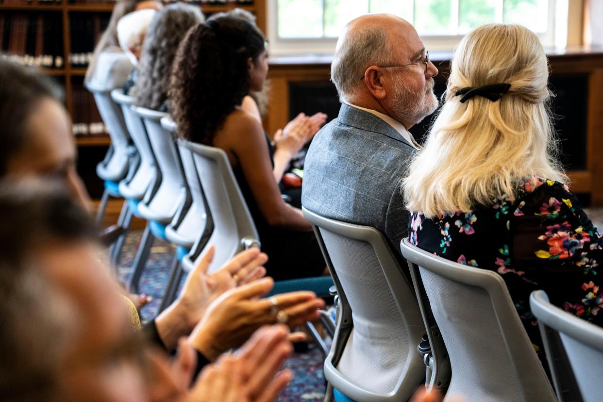 Drake University Board of Trustees member Greg Johansen sits in the audience next to his wife, Cecelia, right, during a donation announcement at Cowles Library on Tuesday, May 14, 2024, in Des Moines.