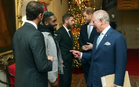 Tinie Tempah and Prince Charles enjoy a chat ahead of the roundtable discussions - Credit: PA